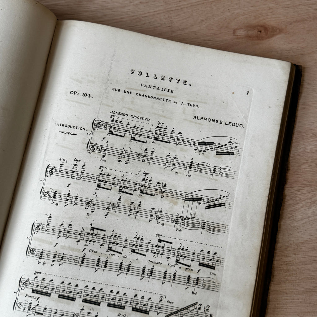 Set of two early-mid 19th century music books compiled by hand, with some notes in pen and pencil. Unique and personal, with gorgeous colour images and covers amongst the scores.