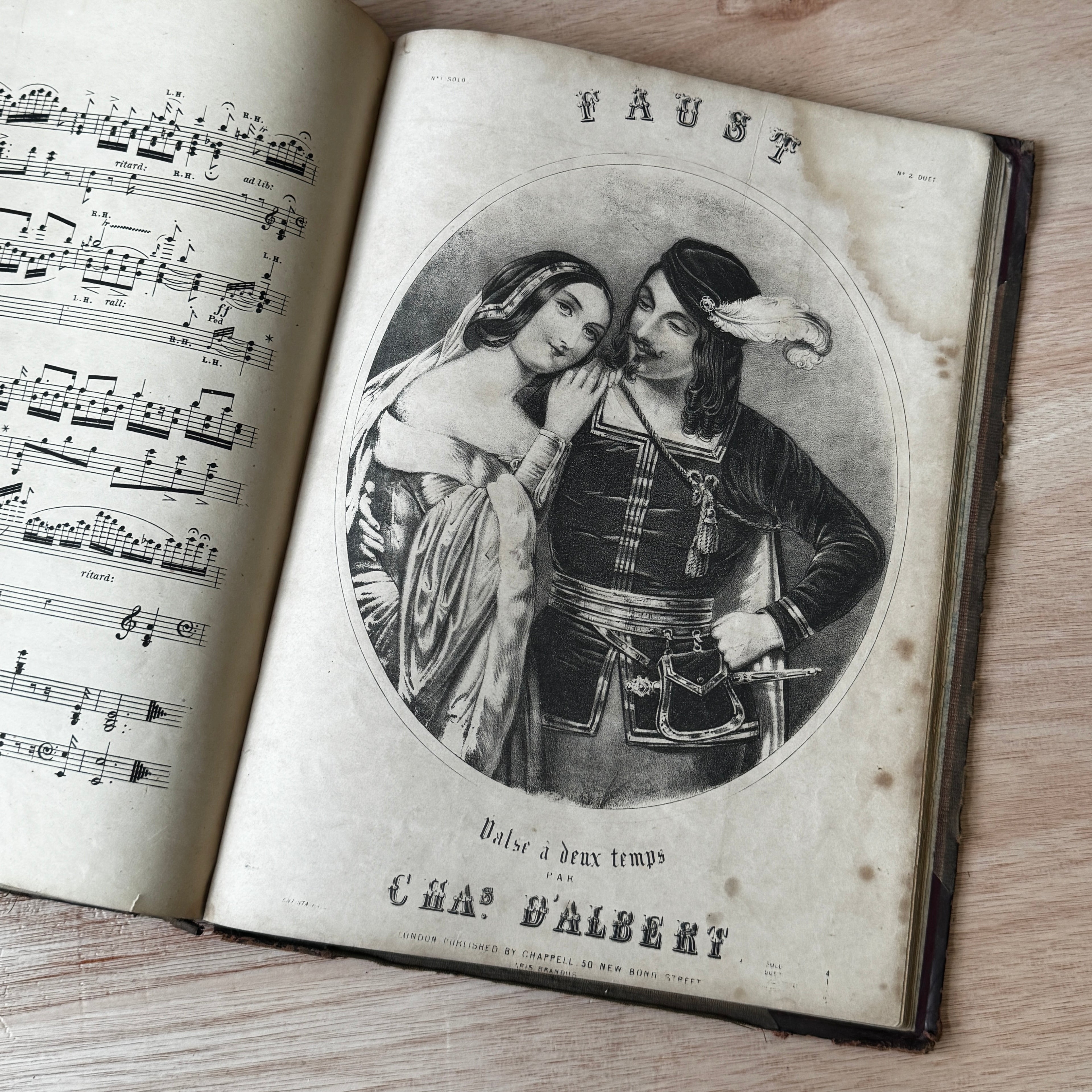 Set of two early-mid 19th century music books compiled by hand, with some notes in pen and pencil. Unique and personal, with gorgeous colour images and covers amongst the scores.