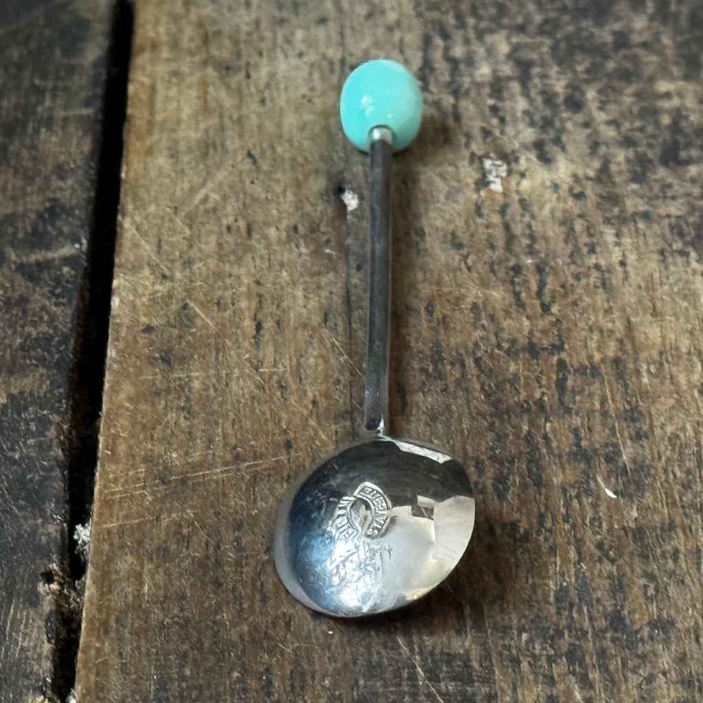 Mid-century coffee spoons with stylised turquoise espresso bean terminals