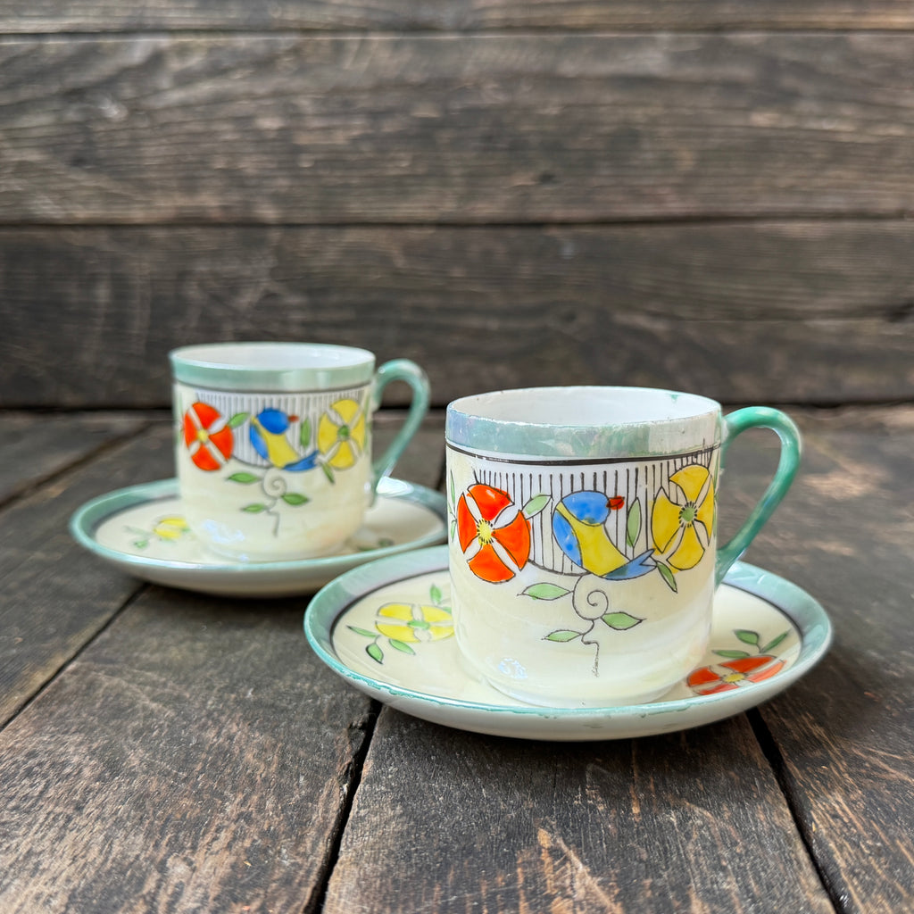 Delicate porcelain espresso cups and saucers, set of two