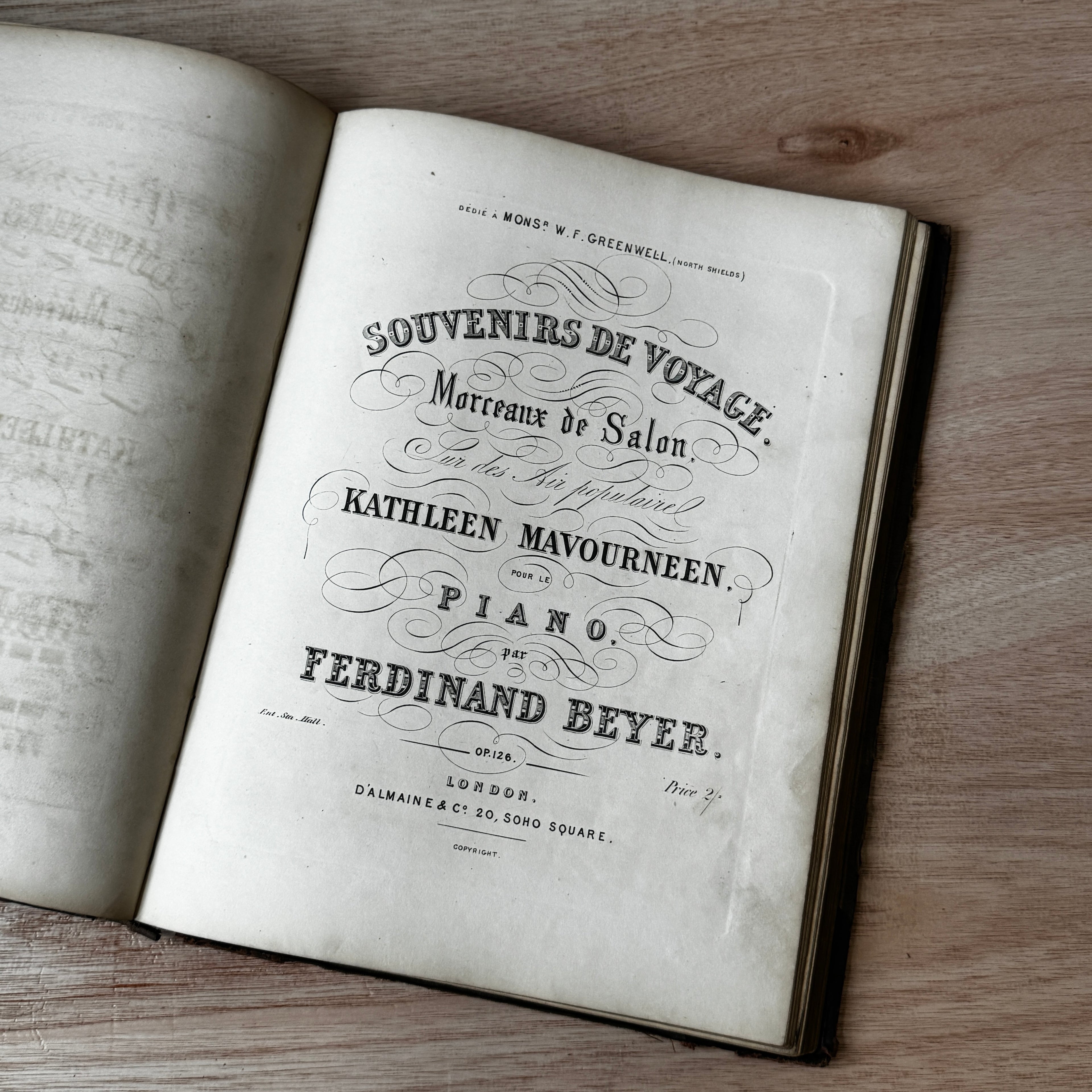 Set of two early-mid 19th century music books compiled by hand, with some notes in pen and pencil. Unique and personal, with gorgeous colour images and covers amongst the scores.