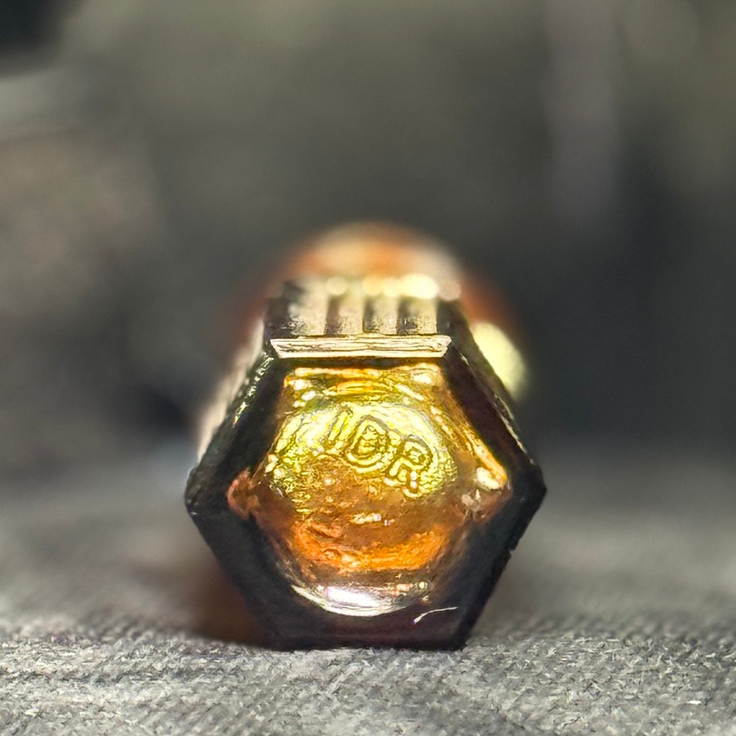 Tiny amber glass 1 dram apothecary bottle