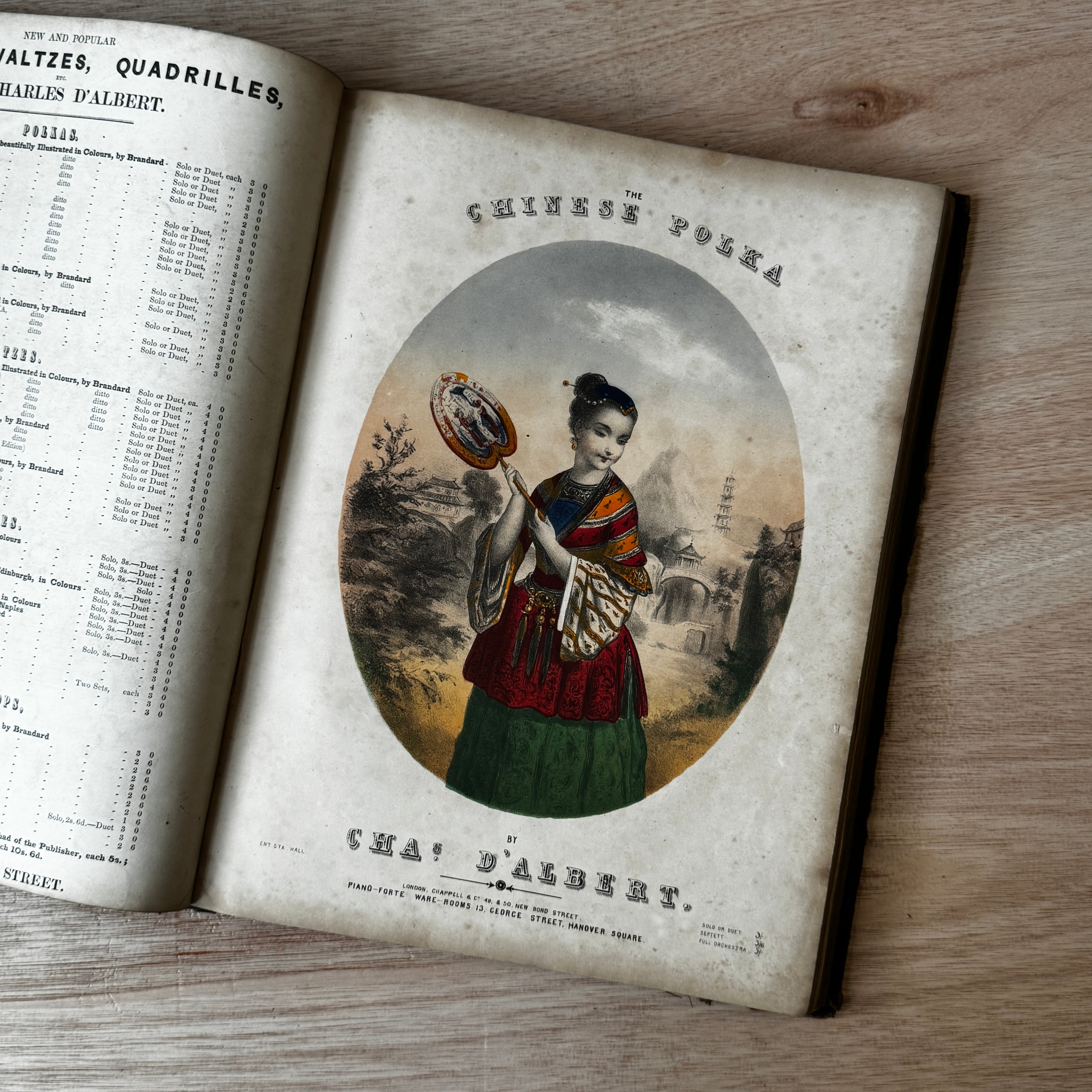 Set of two early-mid 19th century music books compiled by hand, with some notes in pen and pencil. Unique and personal, with gorgeous colour images and covers amongst the scores.