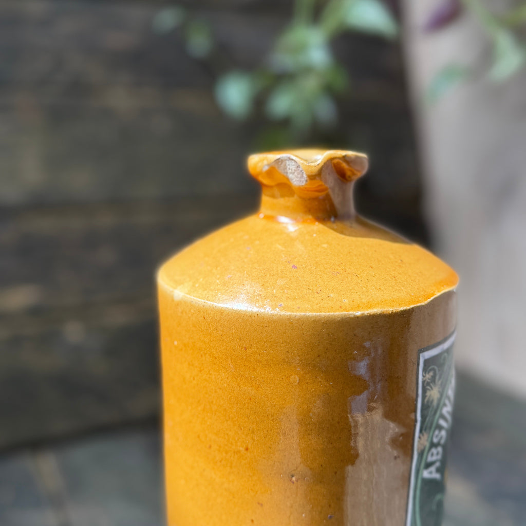 Stoneware bottle with Absinthe Blanoui label