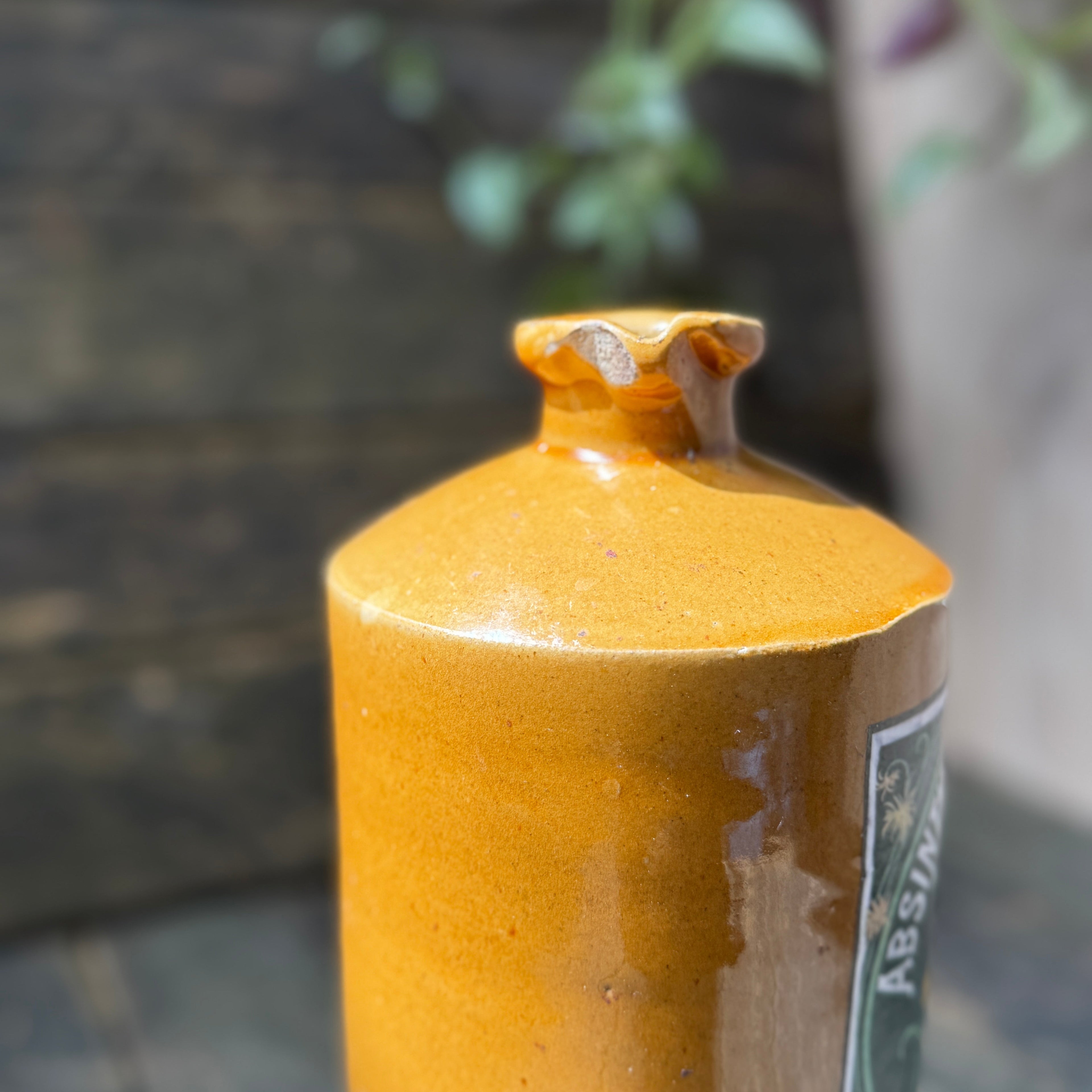 Stoneware bottle with Absinthe Blanoui label