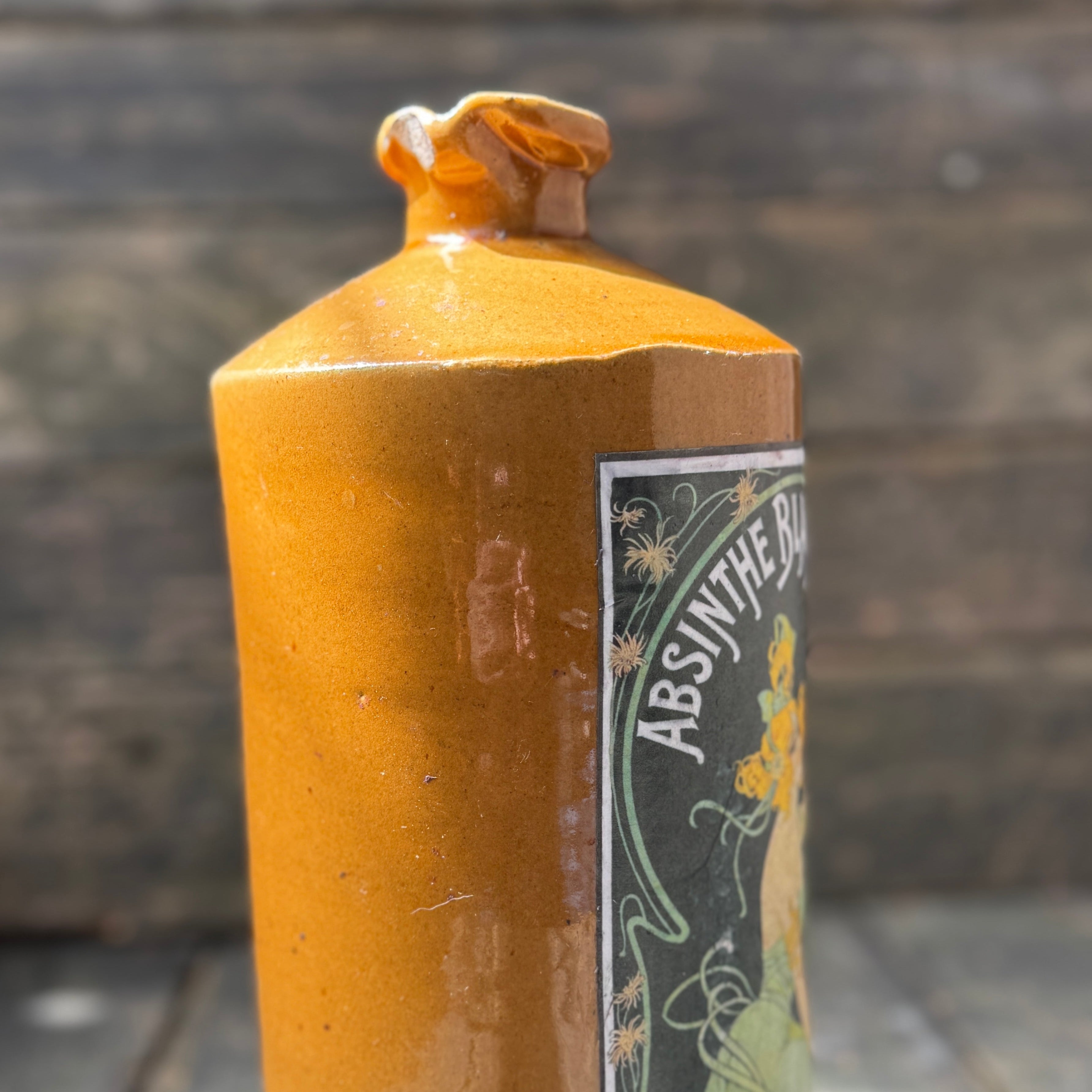 Stoneware bottle with Absinthe Blanoui label