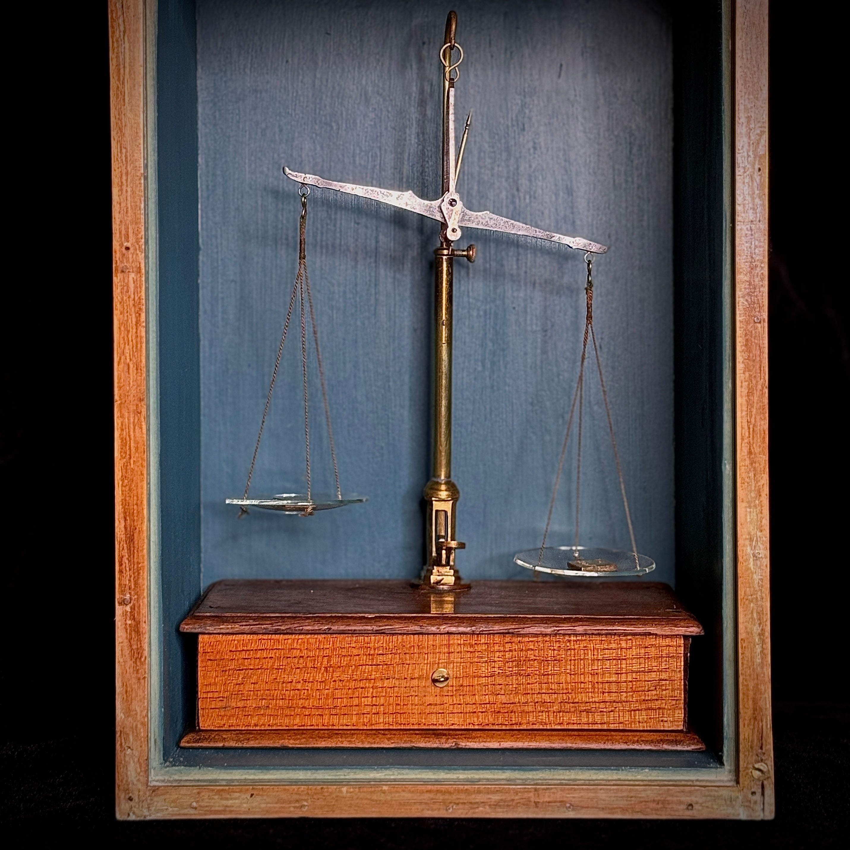 Set of antique apothecary scales in glass-fronted wooden case