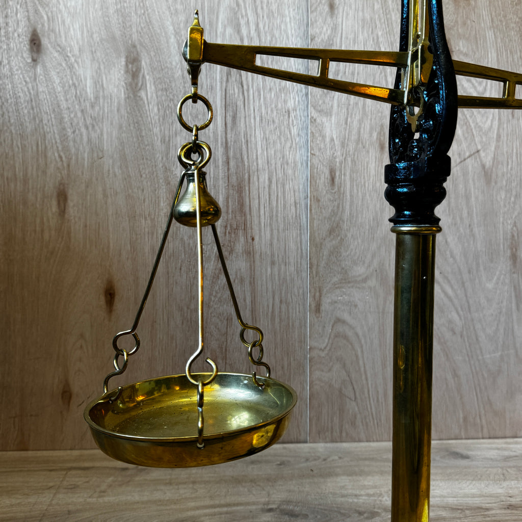 Very large, antique 1880s shop scales. Cast iron and brass with original ceramic weigh plate