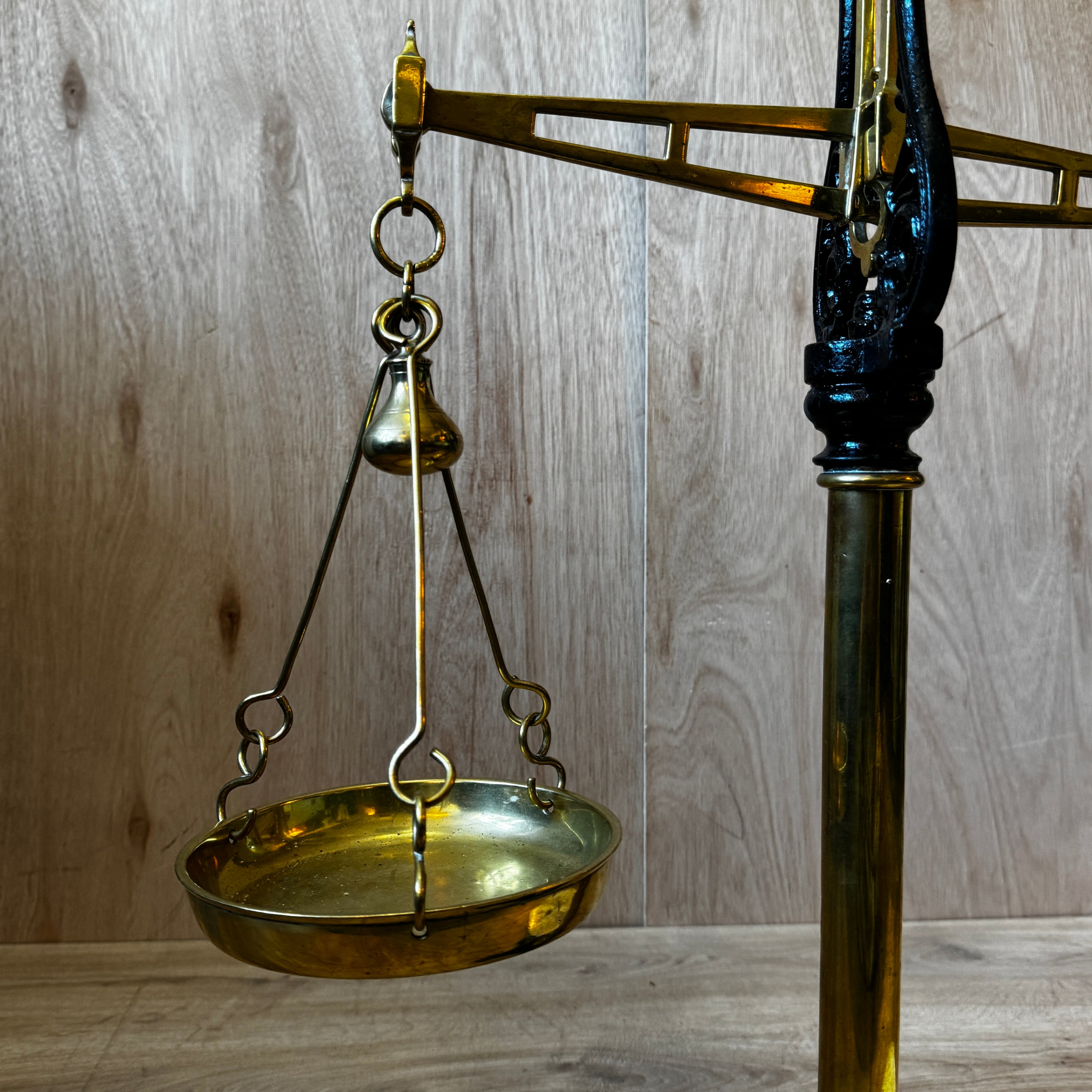 Very large, antique 1880s shop scales. Cast iron and brass with original ceramic weigh plate