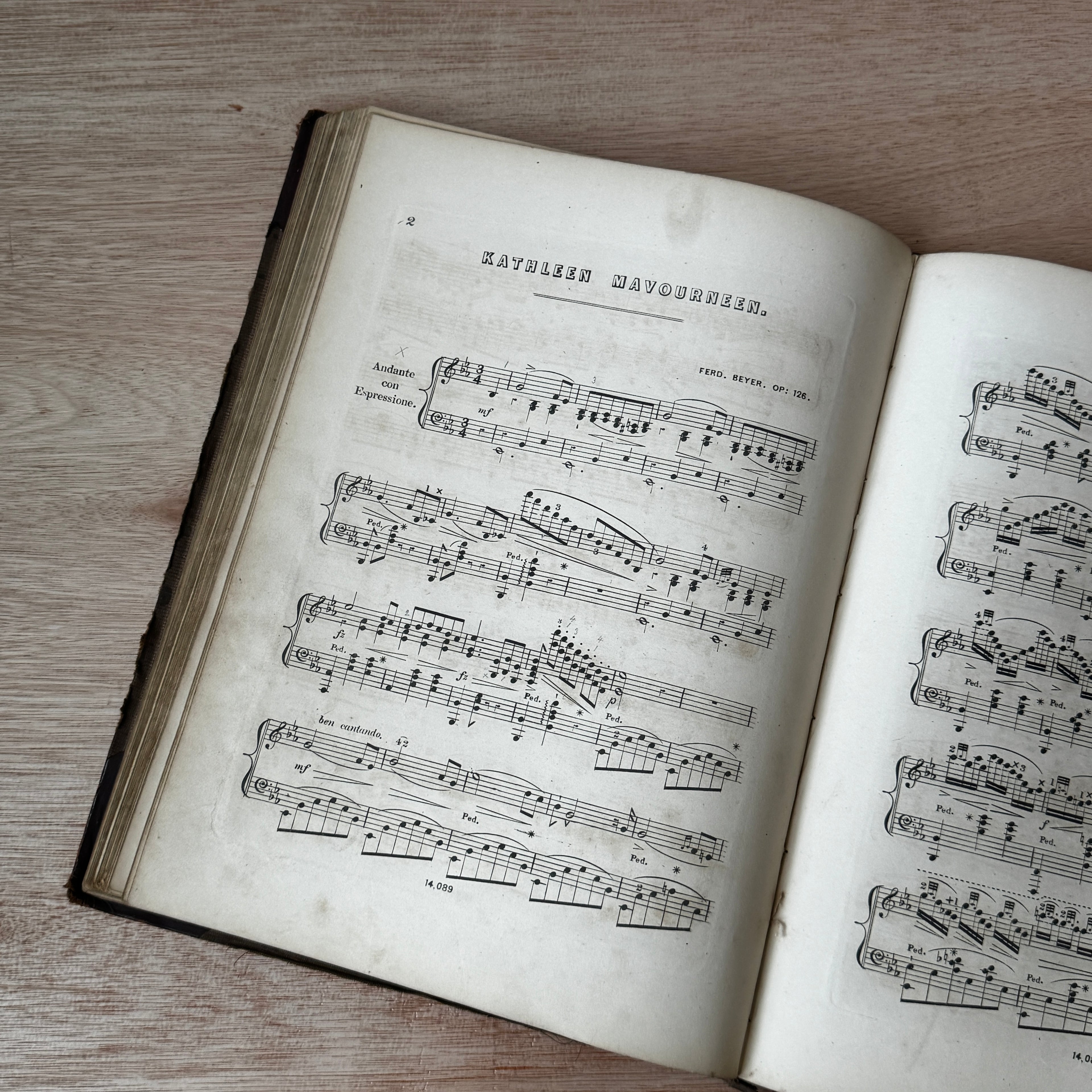 Set of two early-mid 19th century music books compiled by hand, with some notes in pen and pencil. Unique and personal, with gorgeous colour images and covers amongst the scores.