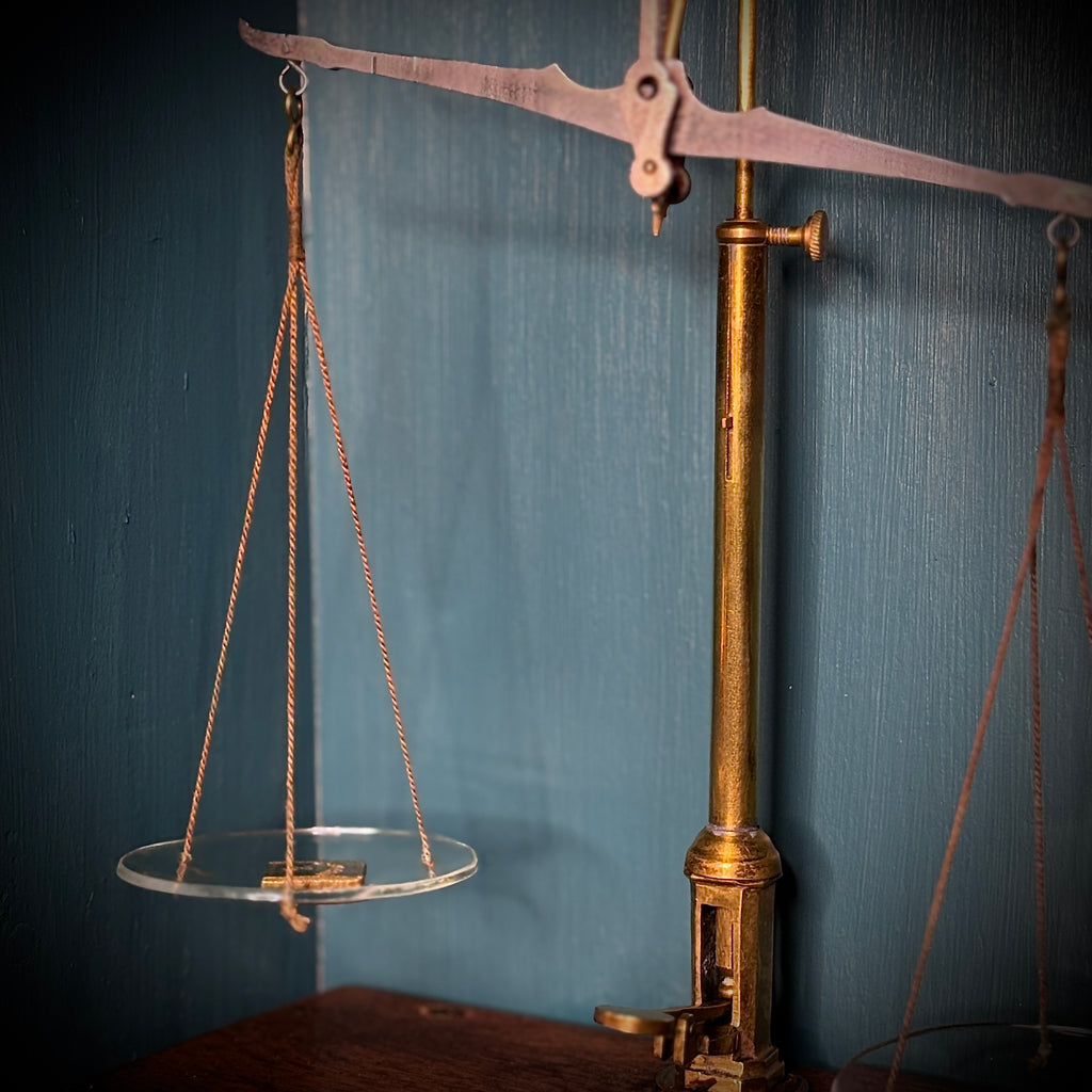 Set of antique apothecary scales in glass-fronted wooden case