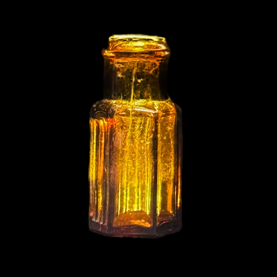 Tiny amber glass 1 dram apothecary bottle