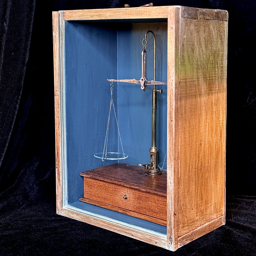 Set of antique apothecary scales in glass-fronted wooden case