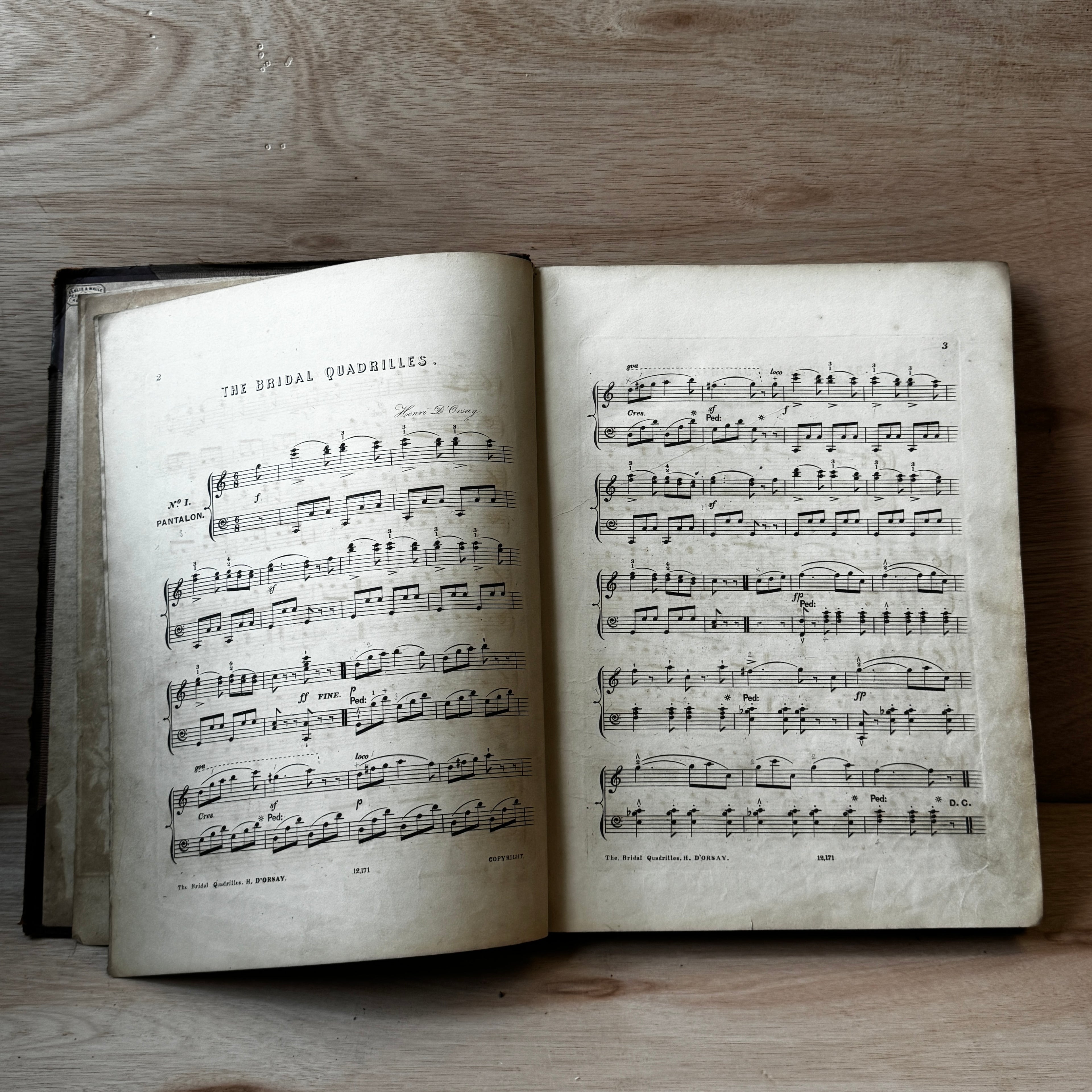 Set of two early-mid 19th century music books compiled by hand, with some notes in pen and pencil. Unique and personal, with gorgeous colour images and covers amongst the scores.