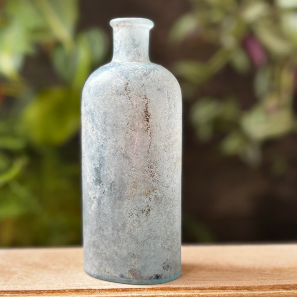 Antique glass bottle with Castor Oil label