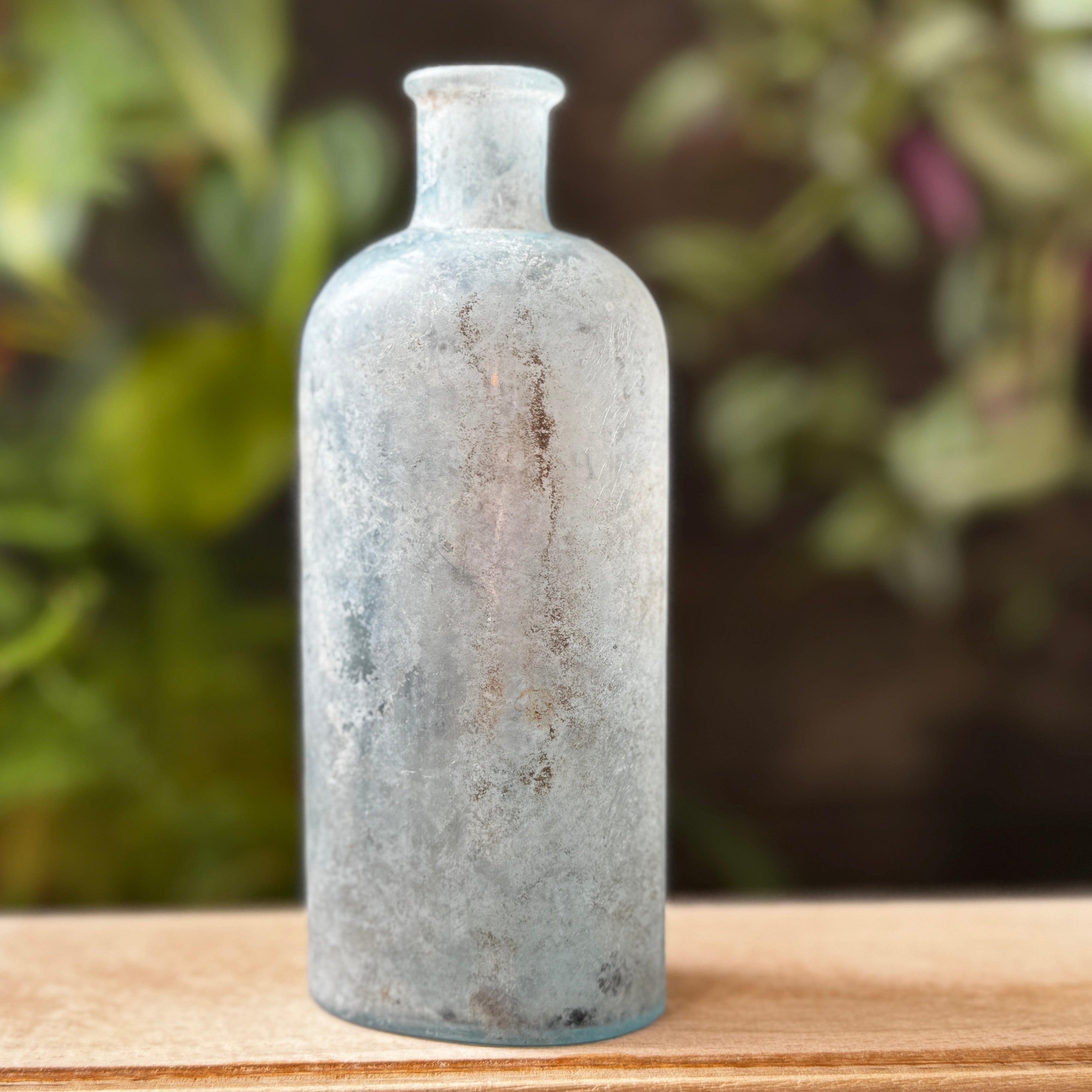 Antique glass bottle with Castor Oil label