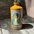 Stoneware bottle with Absinthe Blanoui label
