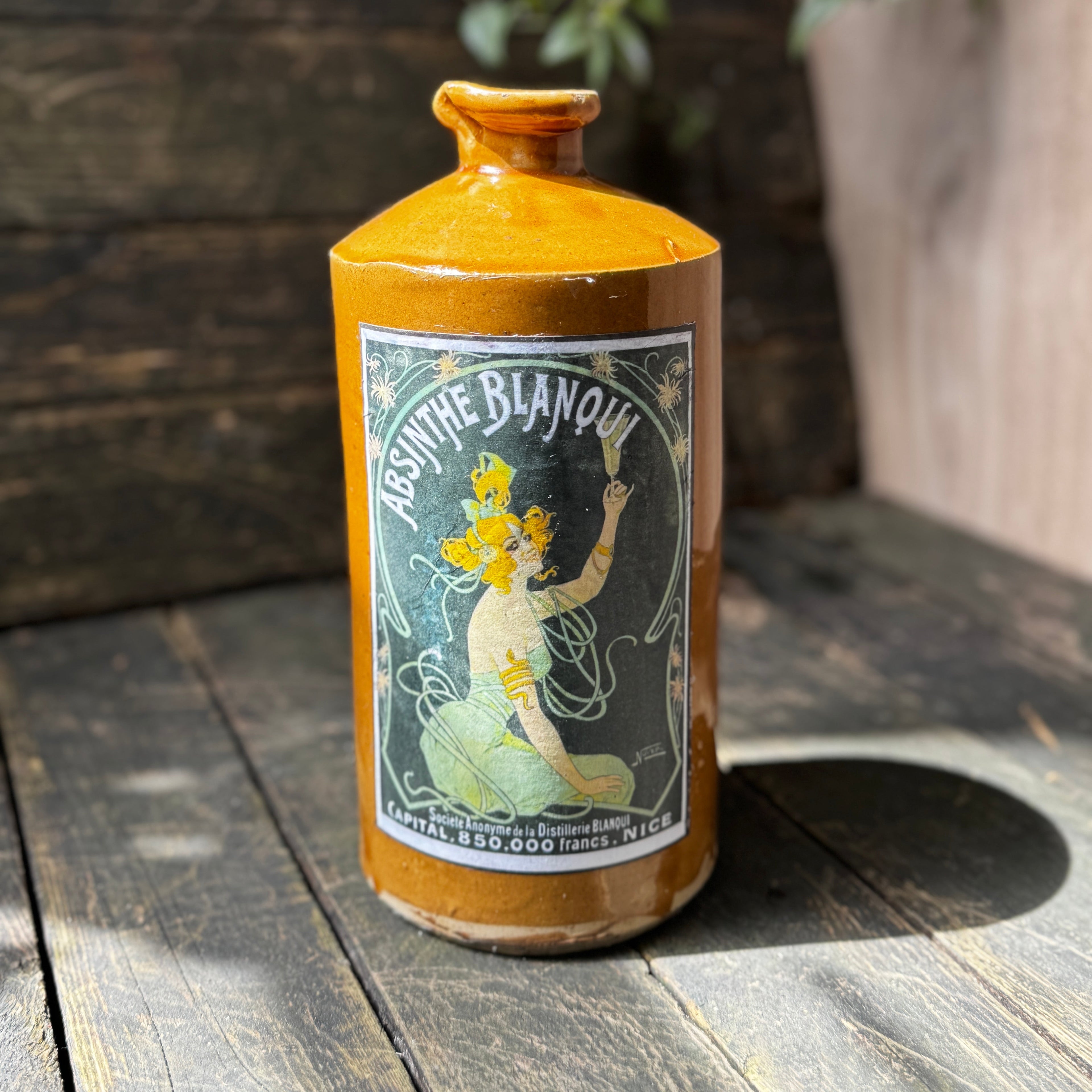Stoneware bottle with Absinthe Blanoui label
