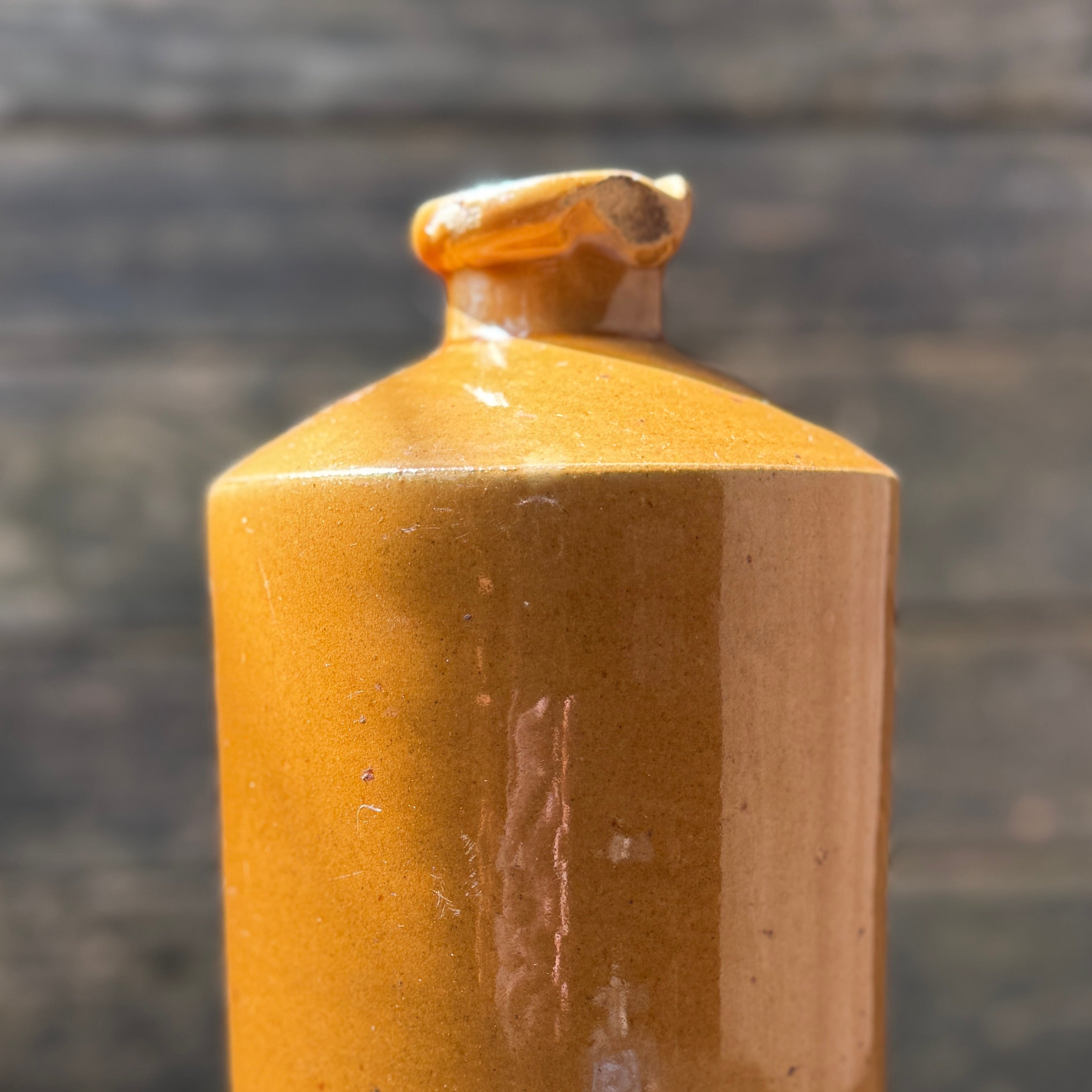 Stoneware bottle with Absinthe Blanoui label