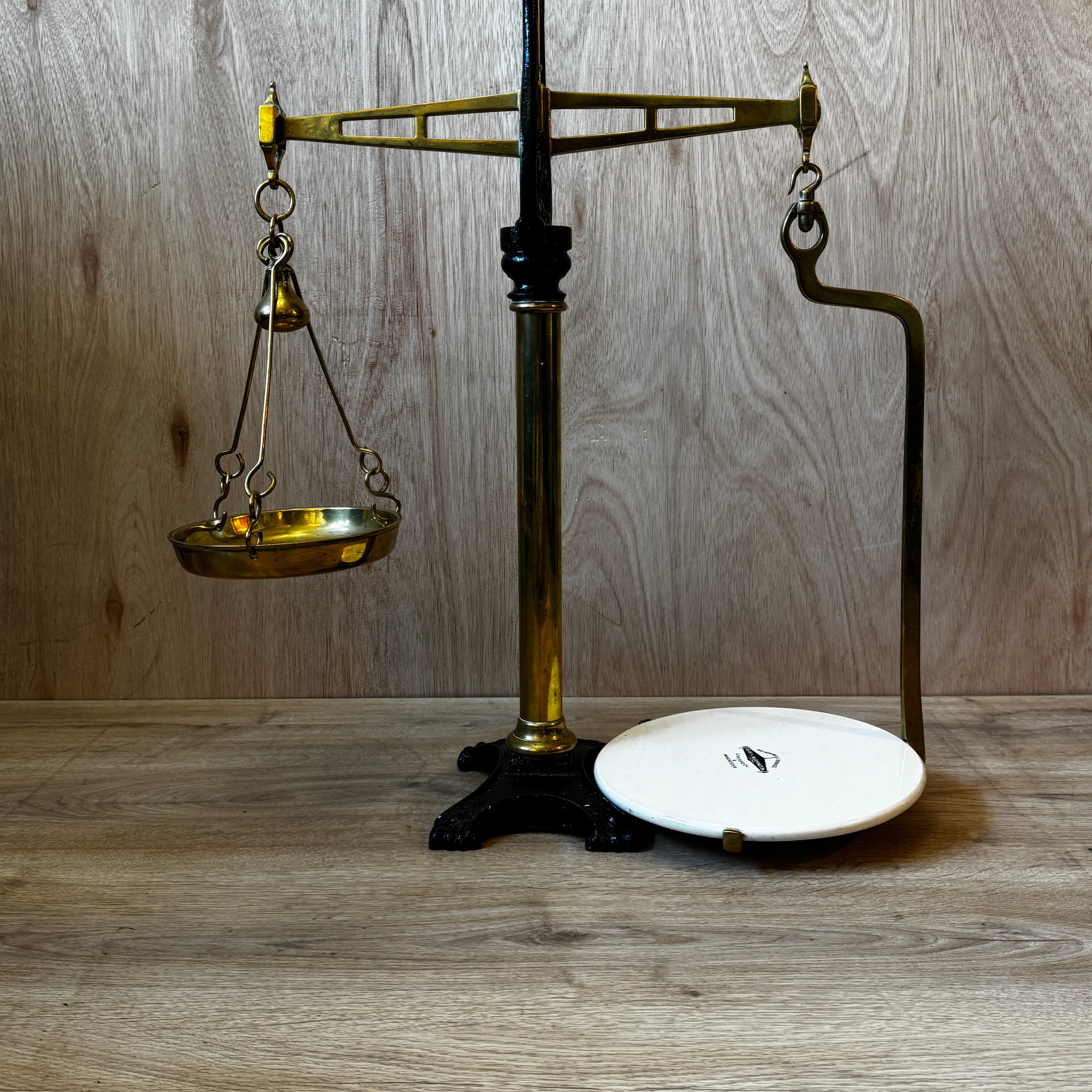 Very large, antique 1880s shop scales. Cast iron and brass with original ceramic weigh plate