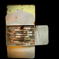 Antique botany samples in glass vials, stored (as found) in early 20th century collectible cigarette tin