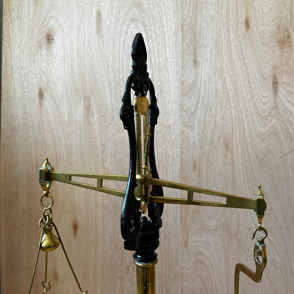 Very large, antique 1880s shop scales. Cast iron and brass with original ceramic weigh plate