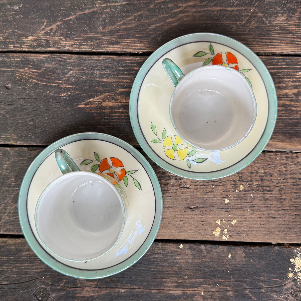 Delicate porcelain espresso cups and saucers, set of two