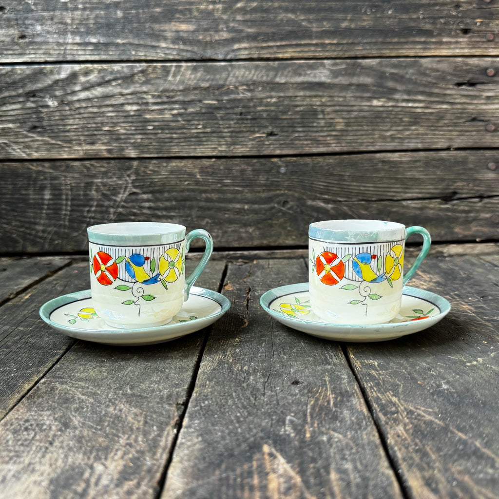 Delicate porcelain espresso cups and saucers, set of two