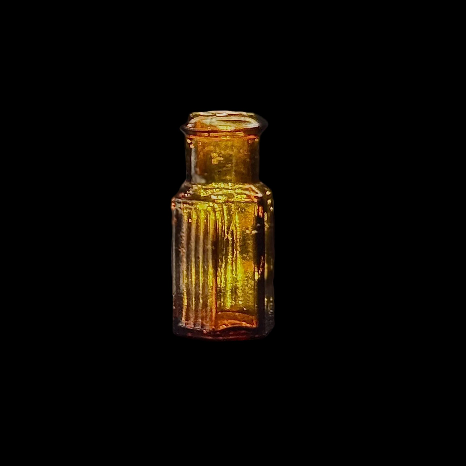 Tiny amber glass 1 dram apothecary bottle