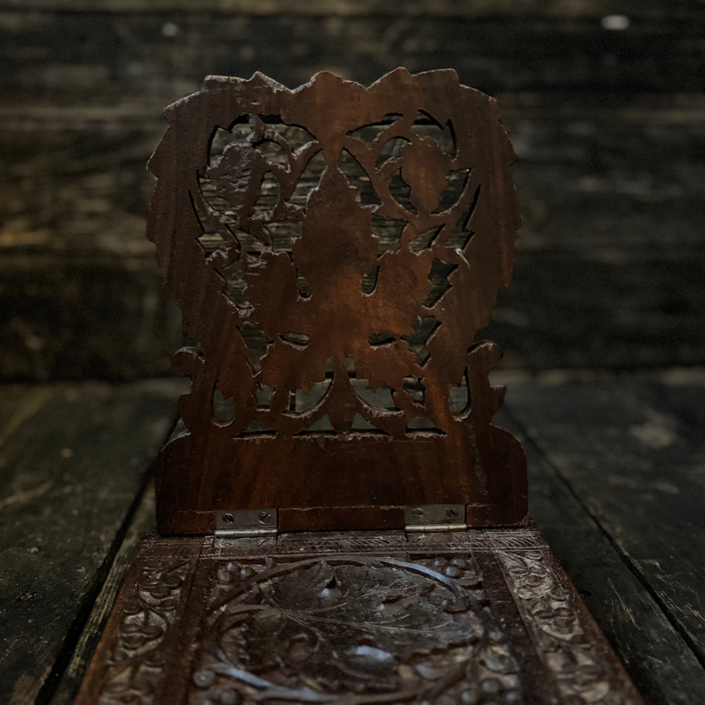 Hand-carved book slide