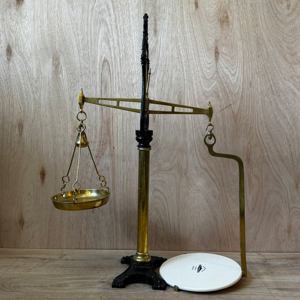 Very large, antique 1880s shop scales. Cast iron and brass with original ceramic weigh plate