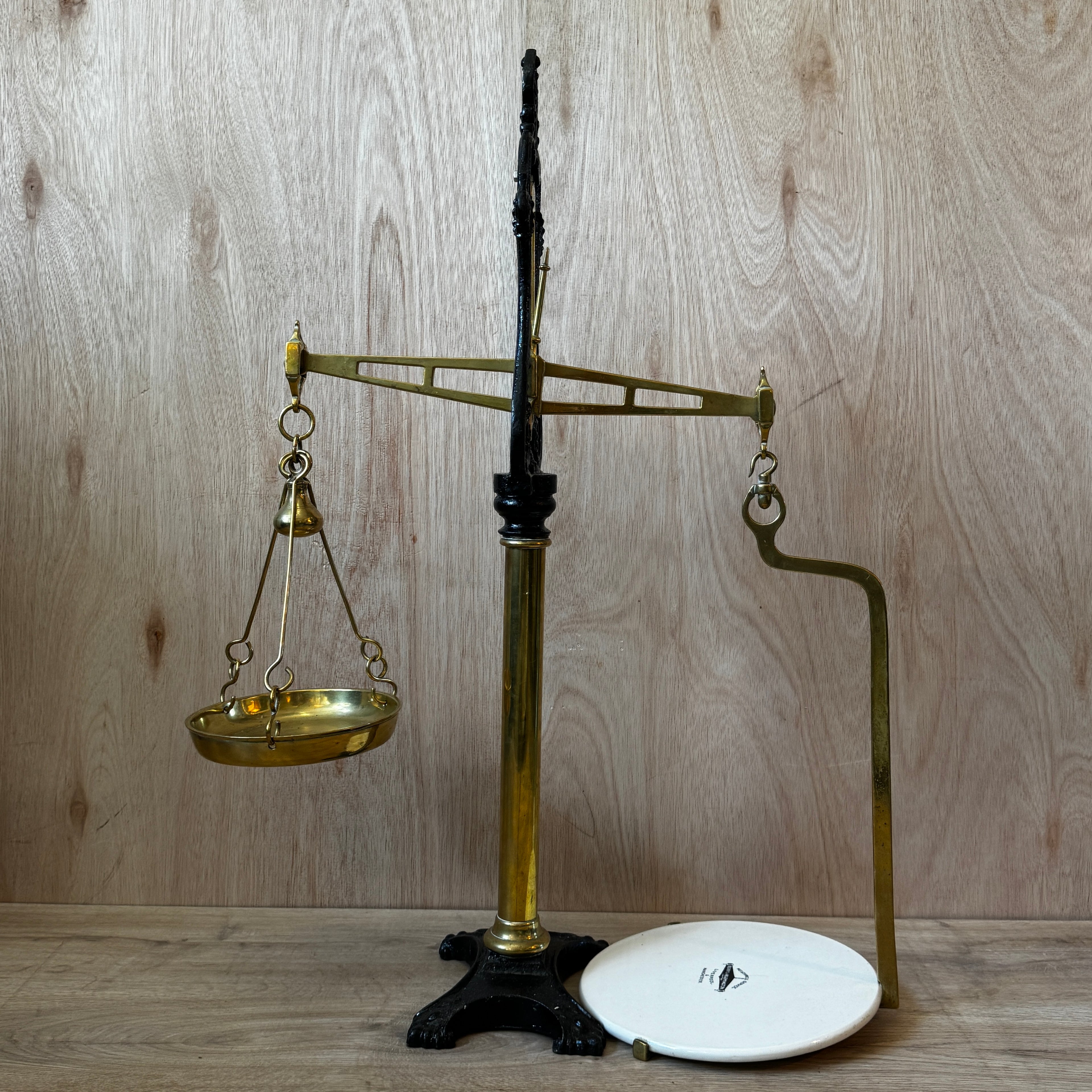 Very large, antique 1880s shop scales. Cast iron and brass with original ceramic weigh plate