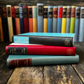 Set of three hardcover Cold War era thrillers by spy novelist Eric Ambler
