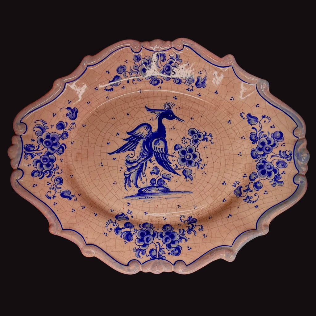 Hand-painted glazed plate of Spanish design