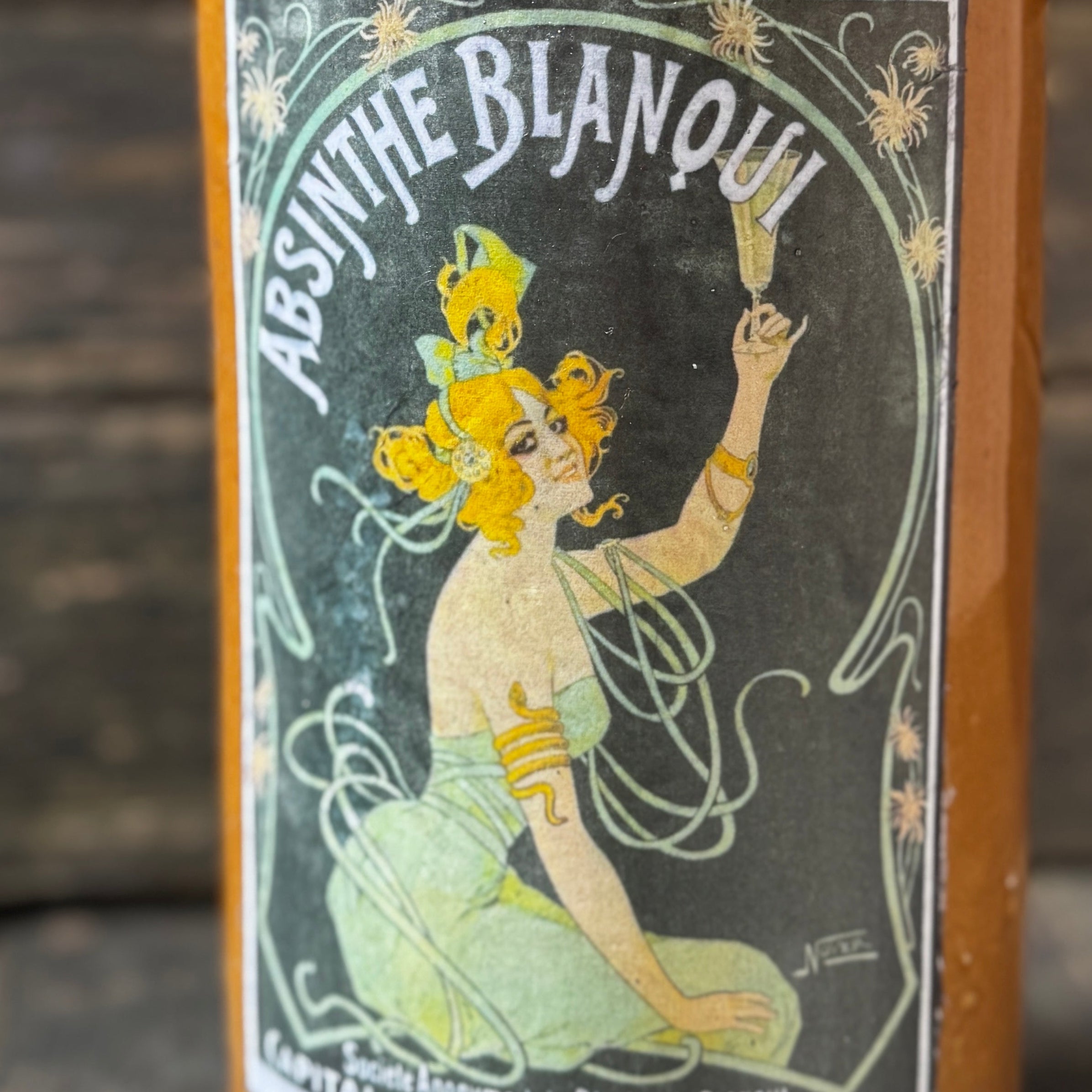 Stoneware bottle with Absinthe Blanoui label