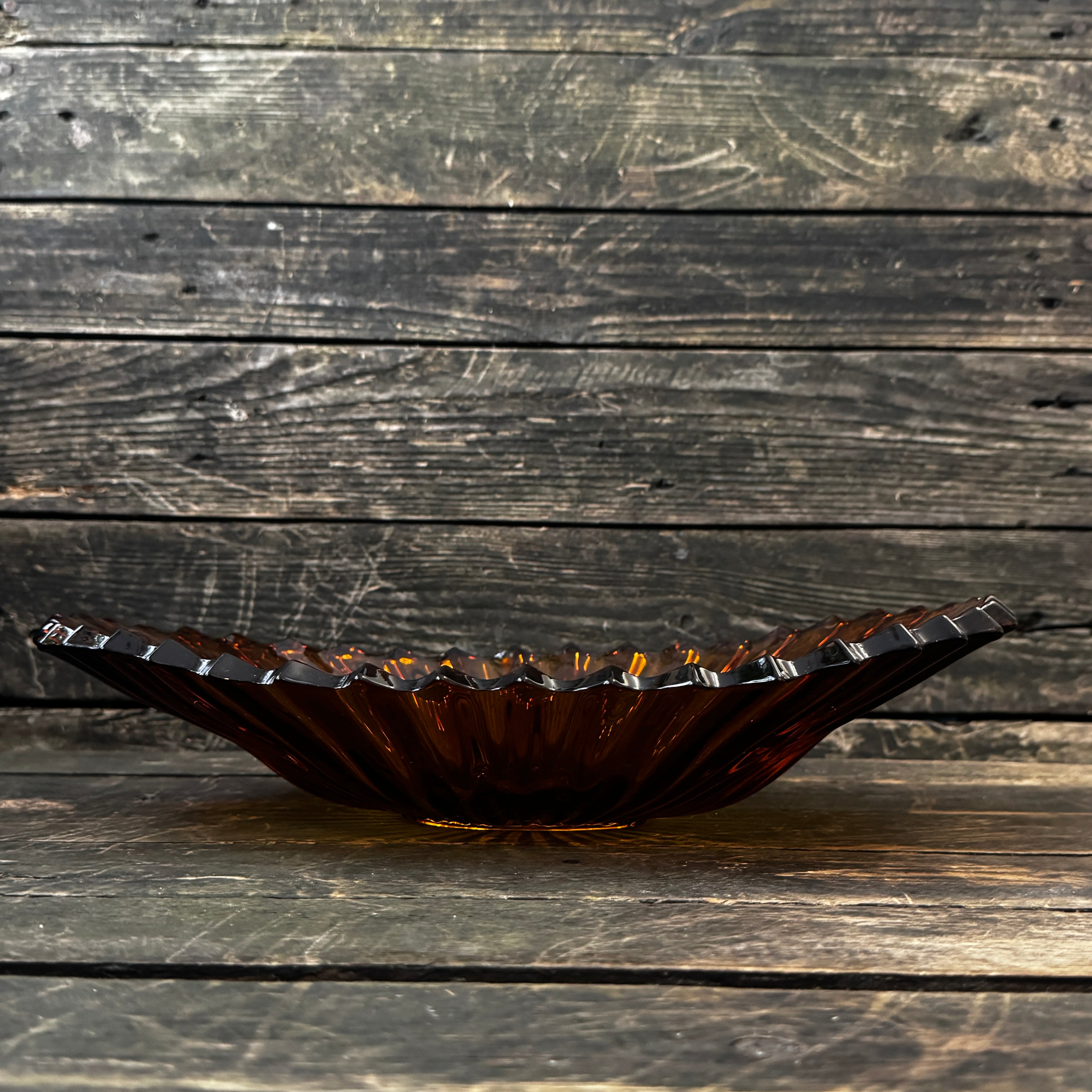 Large Art Deco pressed glass bowl in a rich amber shade 1930s